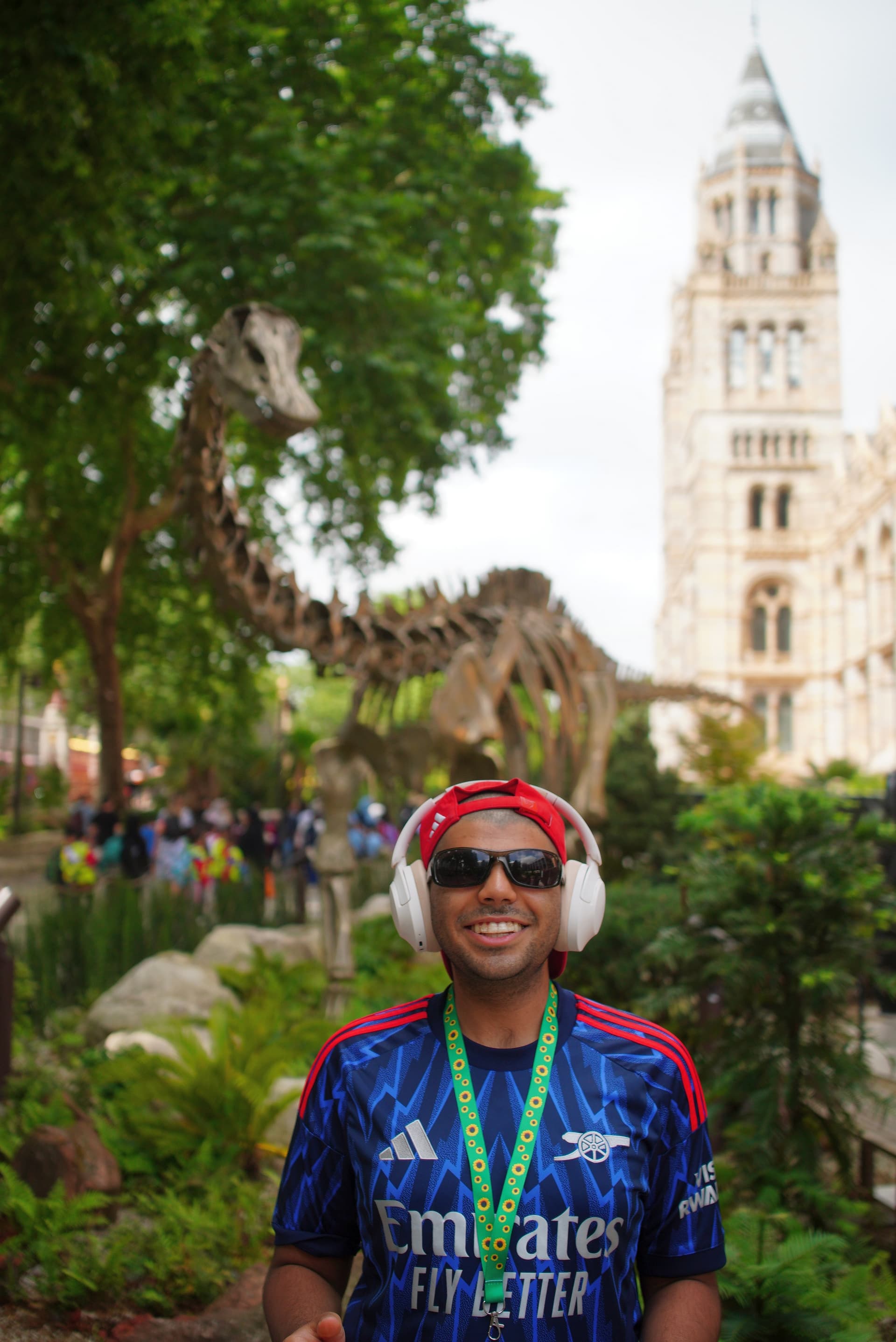 Danyal outside the Natural History Museum with Dippy the Diplodocus