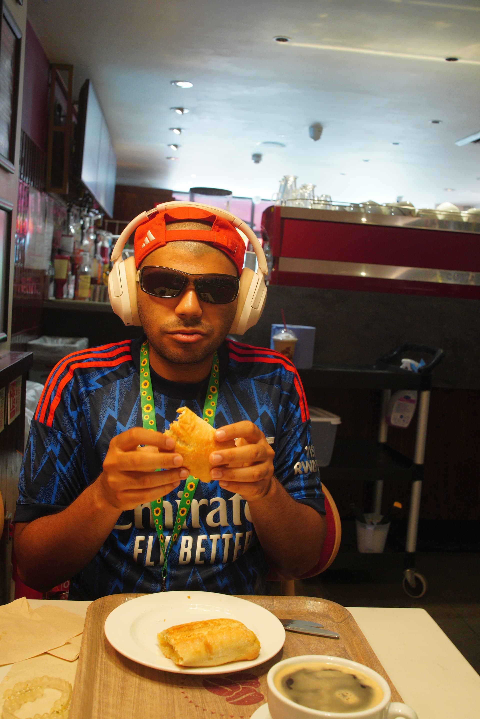 Danyal with a panini at Costa Arnos Grove