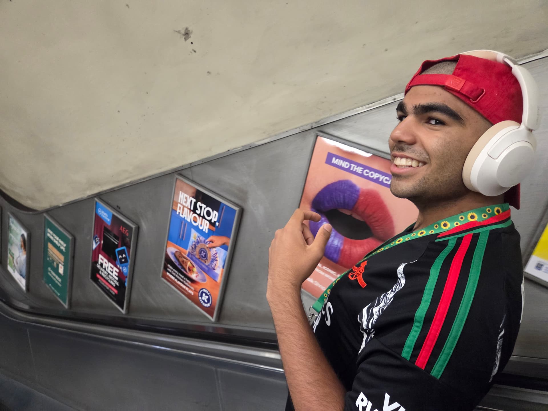 Danyal going down the escalator at Bounds Green station